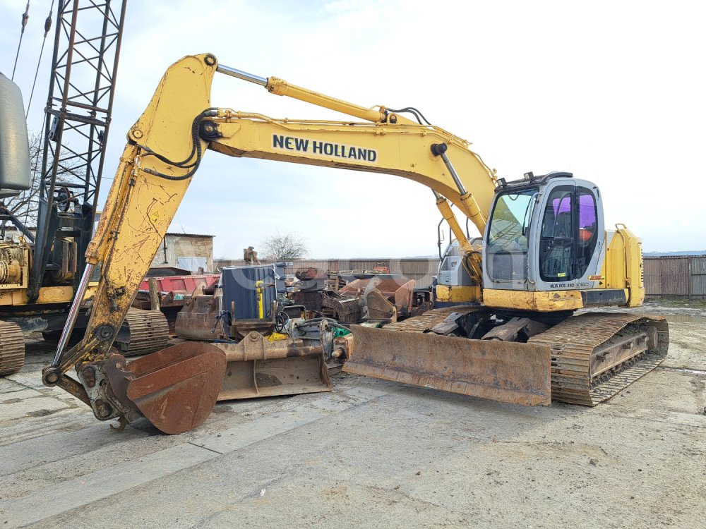 Online aukce: NEW HOLLAND  E 235 SR-1ES