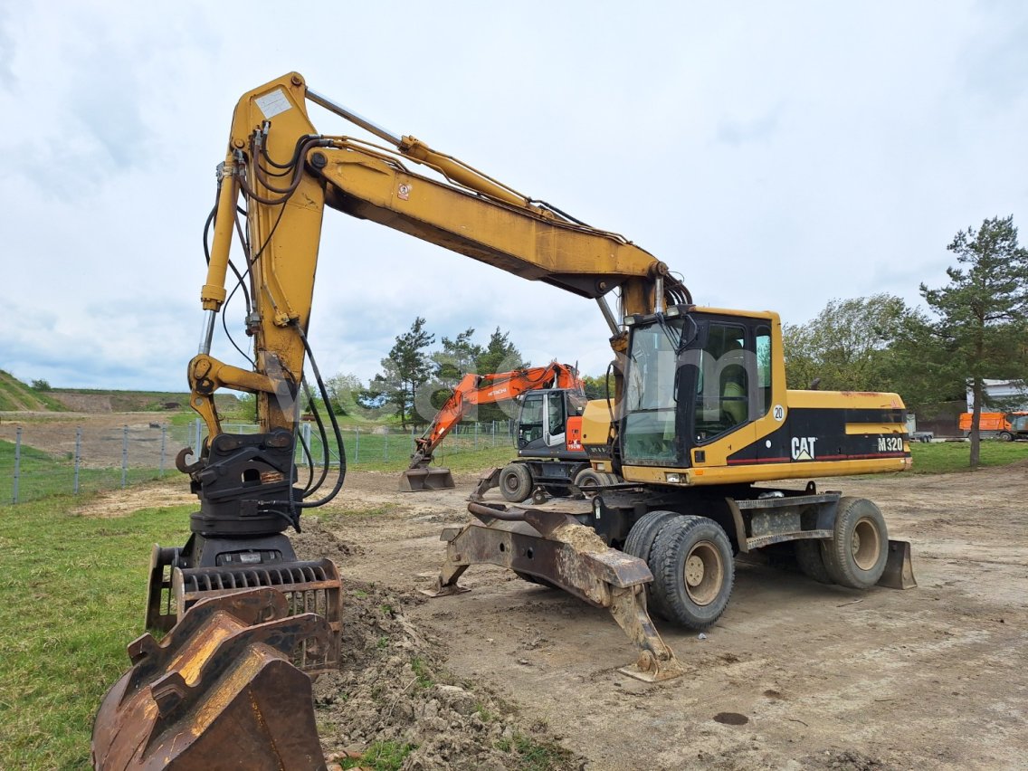 Online auction: CAT  M 320