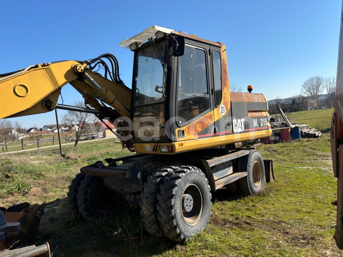 Aukcja internetowa: CAT  M315