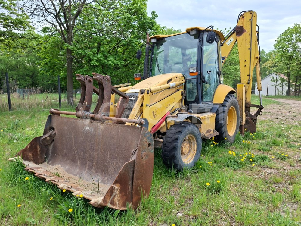 Online aukce: KOMATSU  WB 97 R -5 4X4