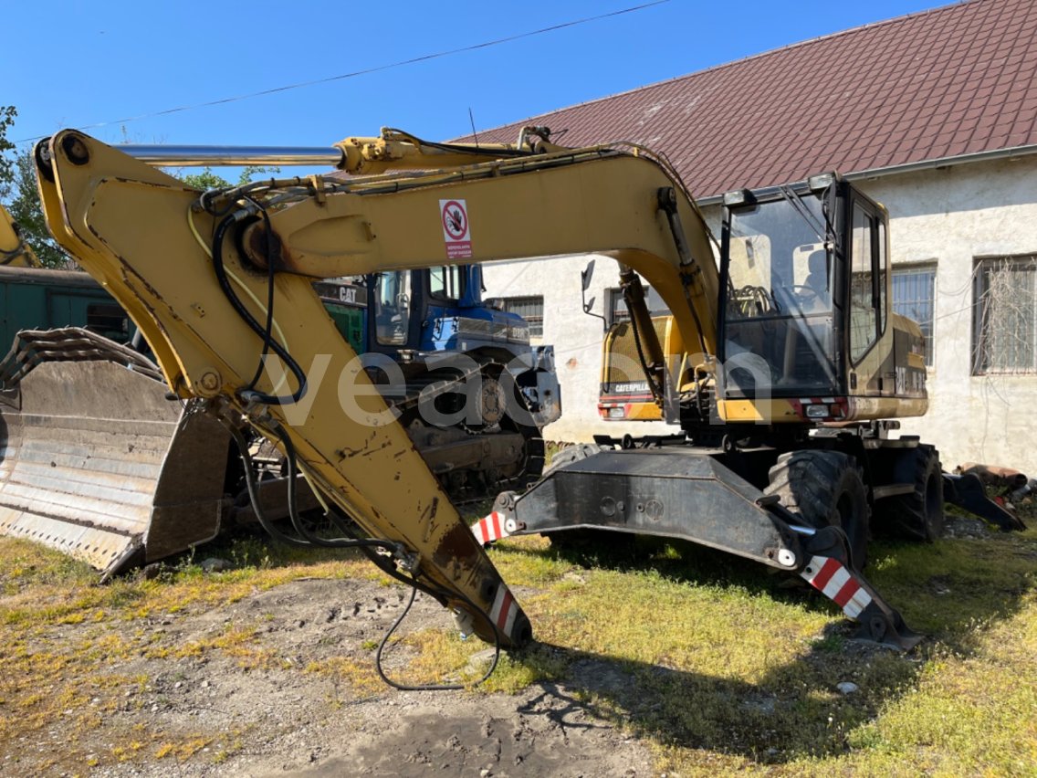 Online auction: CAT  M315