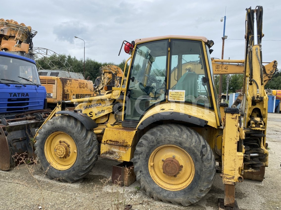 #717 KOMATSU WB97S - 2 - Aukcje pojazdów i maszyn | Veacom
