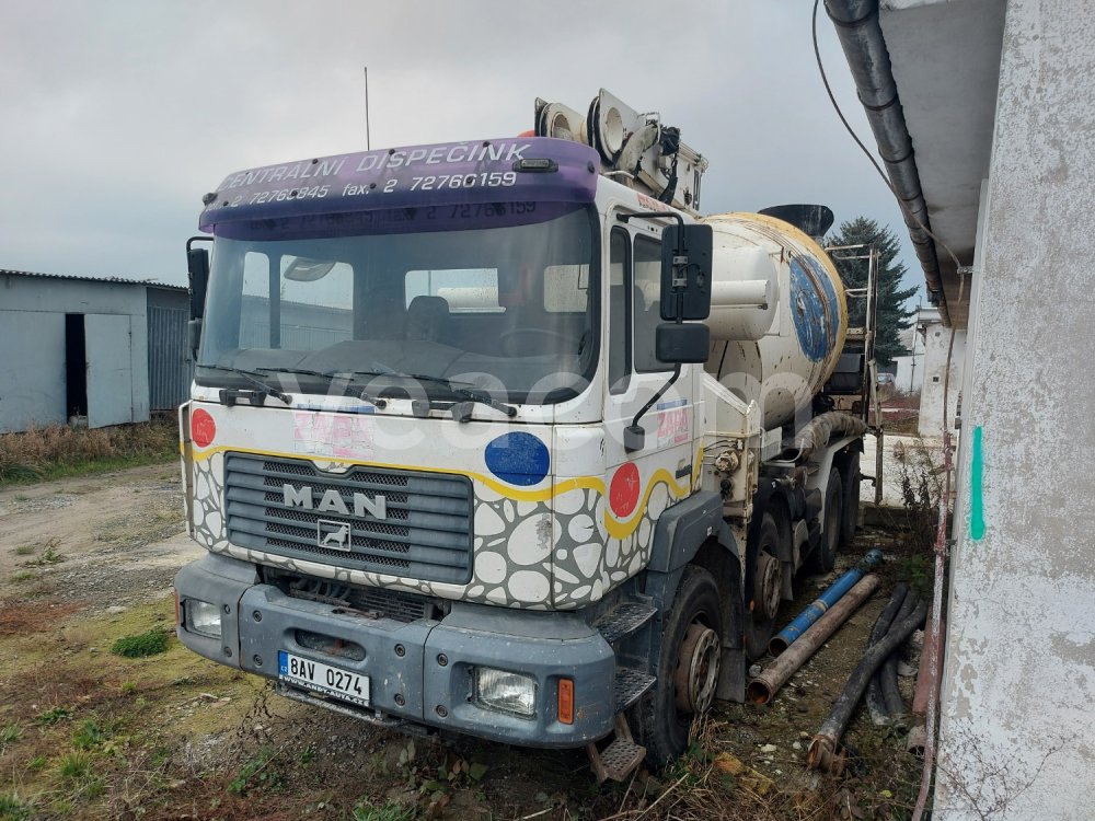 Online auction: MAN  32.414 8x4 + PUTZMEISTER 24