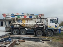 Online auction: MAN  32.414 8x4 + PUTZMEISTER 24